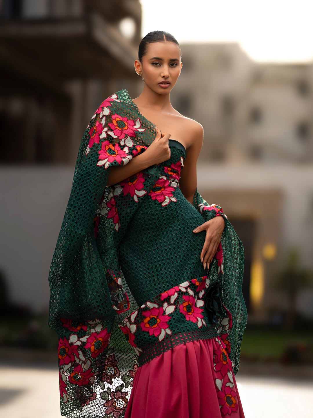 Emerald Reverie — editorial portrait with draped sleeve
